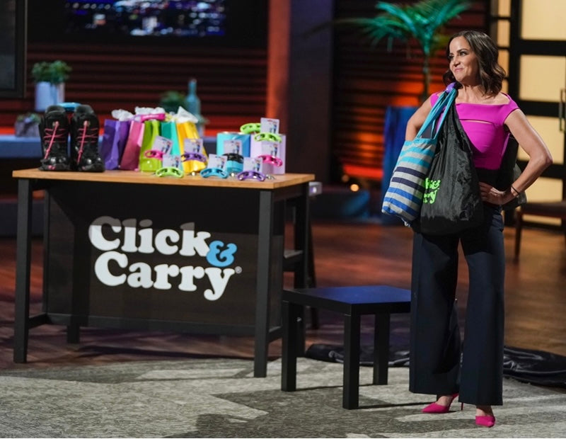 Click Carry is a bag carrier that lets you haul it all hands